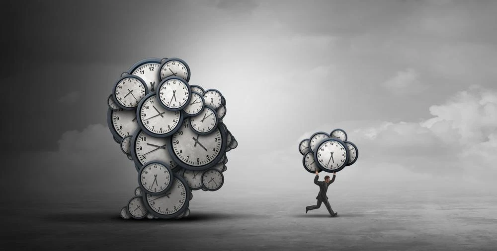 Illustration of a large human head made up of multiple clocks facing left. A smaller figure is running away carrying a smaller cluster of clocks in the same shape. The background is gray and cloudy.