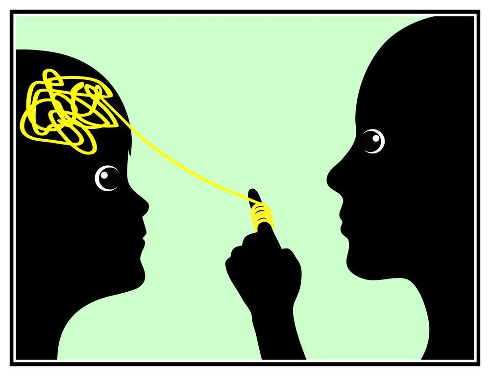 A silhouette of a person unraveling a tangled yellow string originating from the head of another silhouette, symbolizing guidance or help.